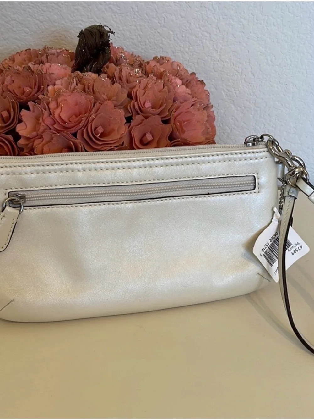 NWT Coach Cream Leather Wristlet Clutch with Perforated Circle Detail